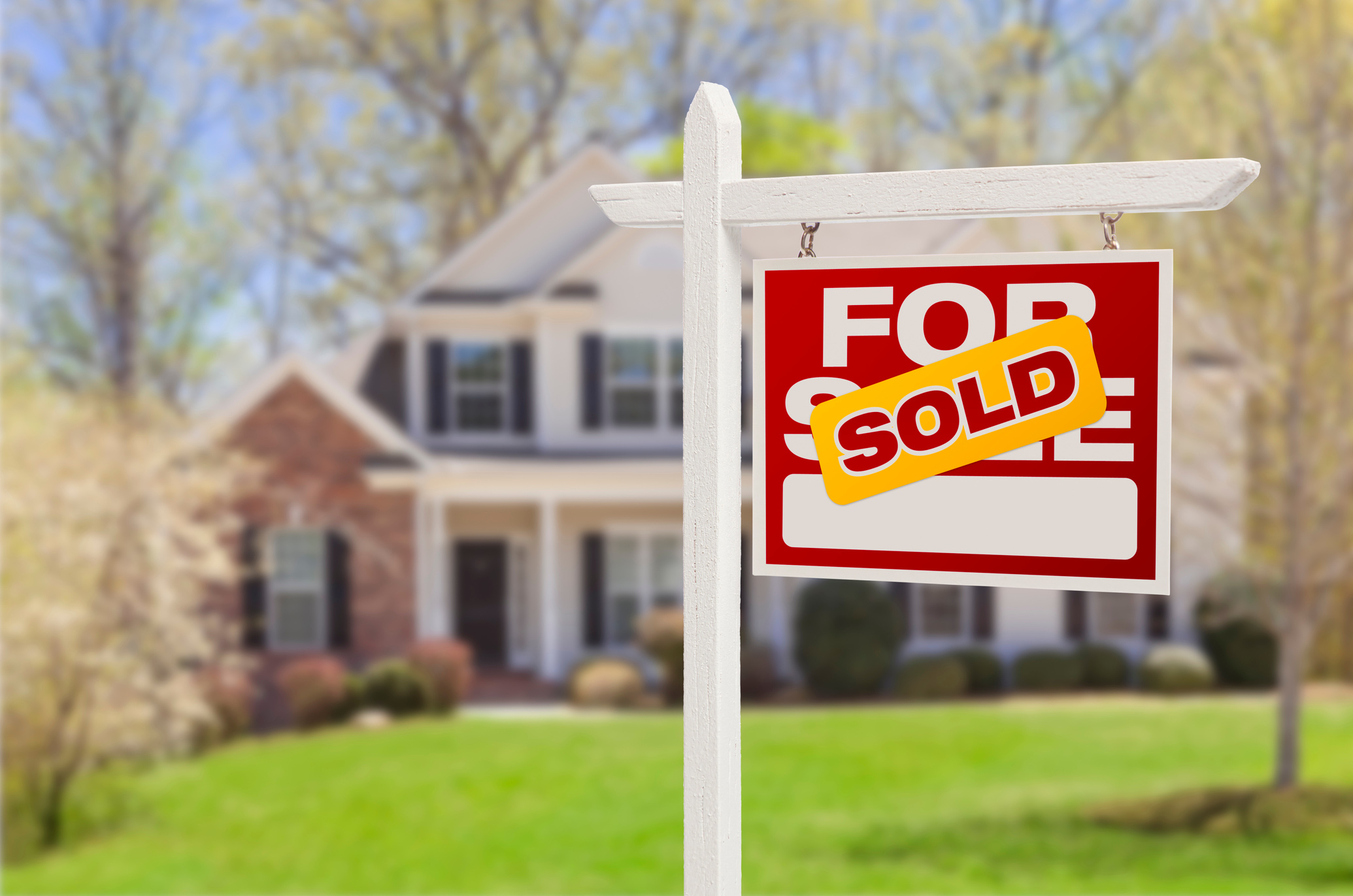 Sold Home for Sale Sign in Front of New House